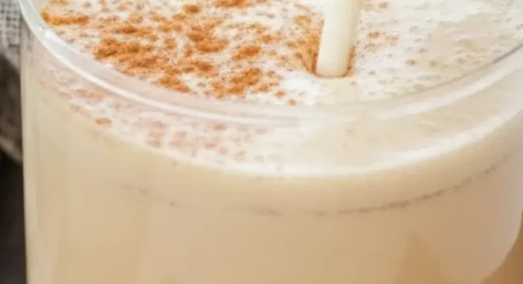 Homemade chai tea latte Starbucks copycat served in a glass mug with cinnamon and star anise